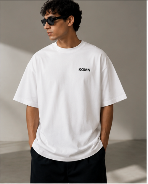 A man wearing a white Oversized Crewneck Tshirt heavy weight 200 GSM 100% cotton, Front View Model