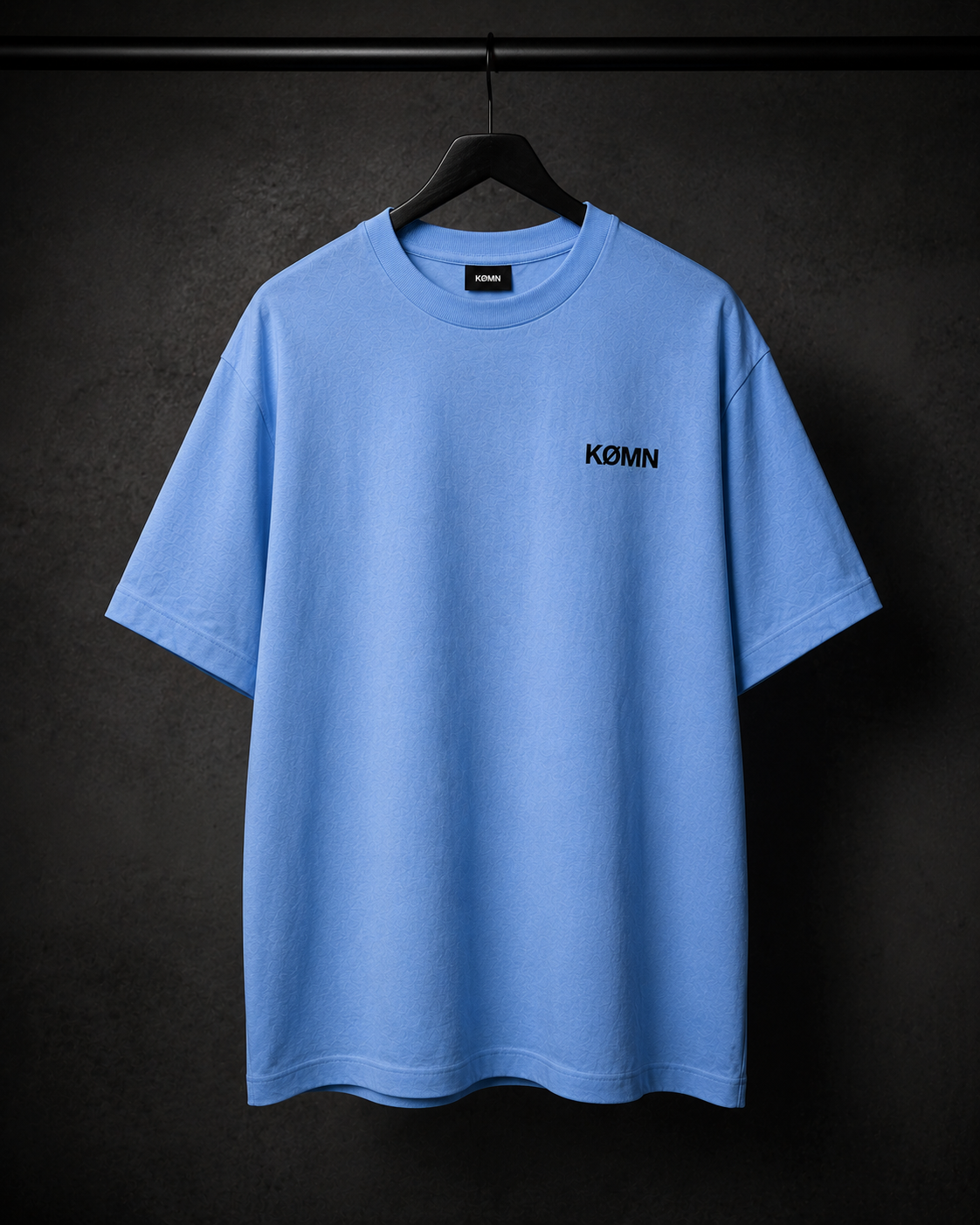KØMN sky blue oversized t-shirt for men front view with black chest logo, 200 GSM 100% cotton tee